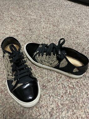 Carolina Herrera Black leather gold floral lace accents Women's Lace-Up Sneakers